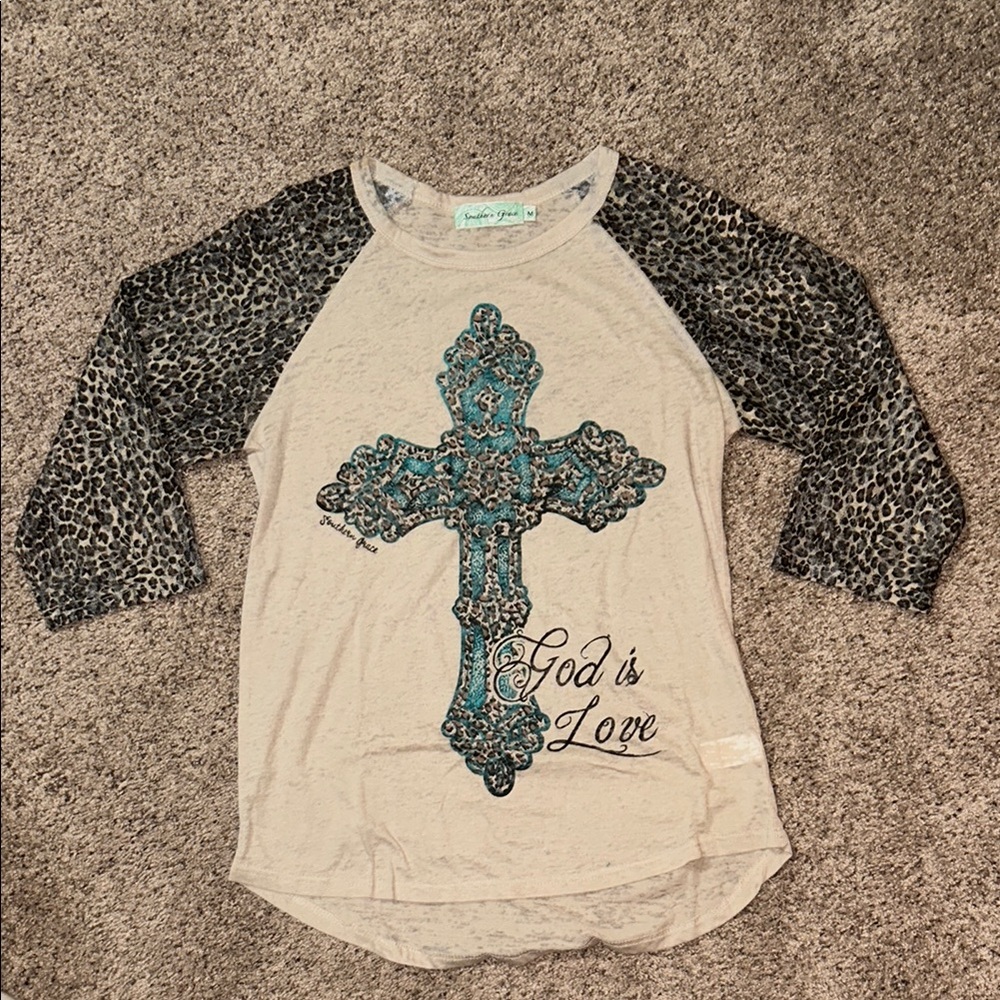 Leopard Sleeve Cross Print Women’s Top
3/4 length sleeve